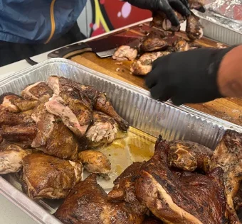 Smoked BBQ chicken being served